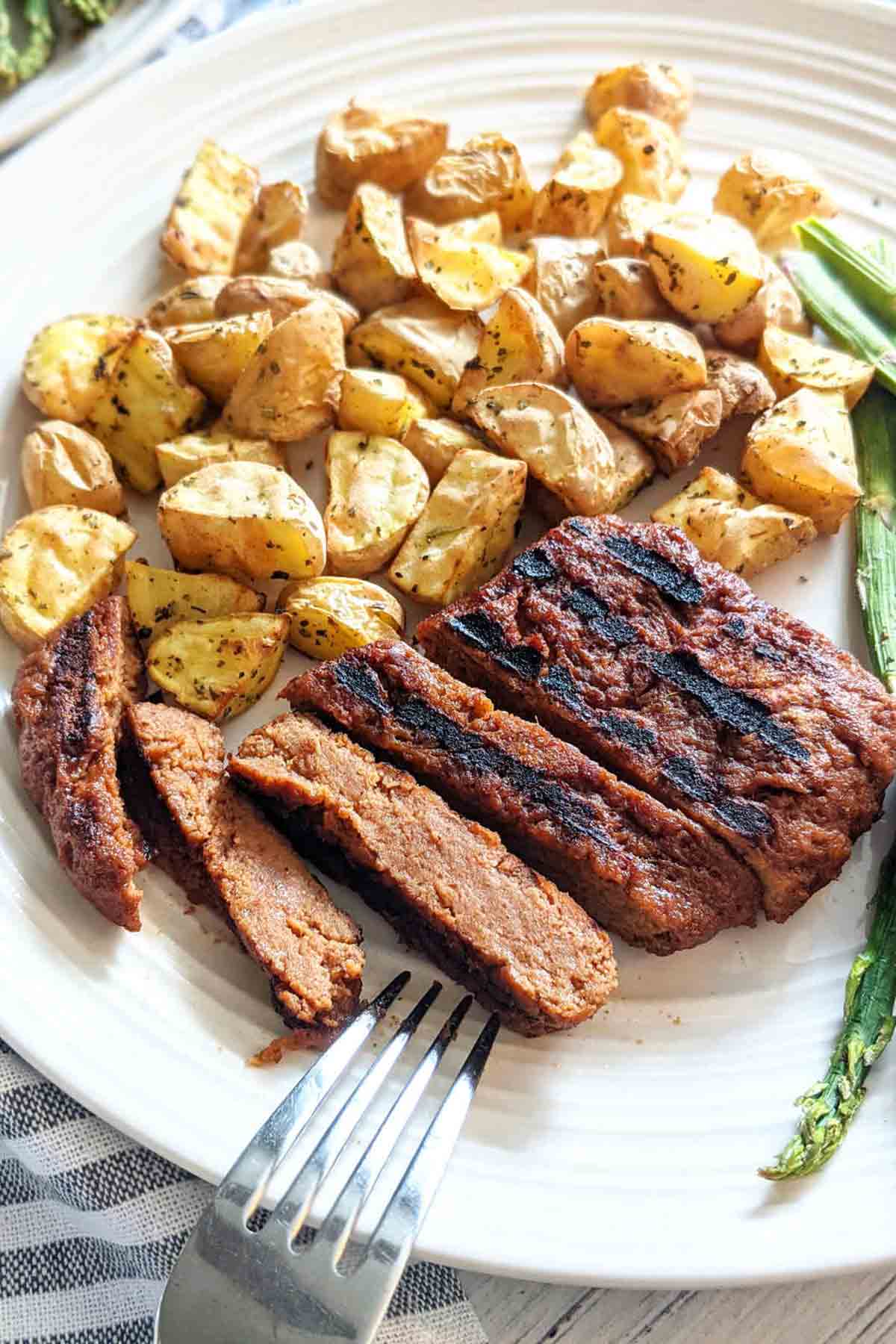 Sliced Vegan Steak And Potatoes