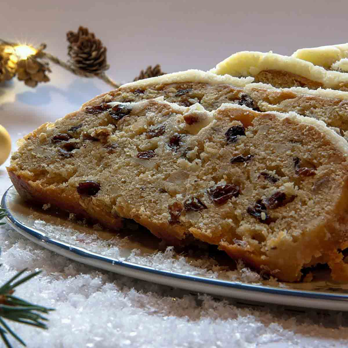 Image Of Slices Of Stollen Fruit Cake On A Plate