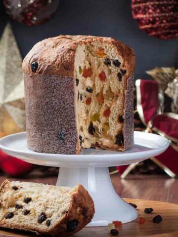 Thumbnail Image For Is Panettone Vegan Post  A Panettone With A Slice Taken Out