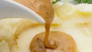 Gravy Being Poured Onto Mashed Potatoes For Is Gravy Vegan Post