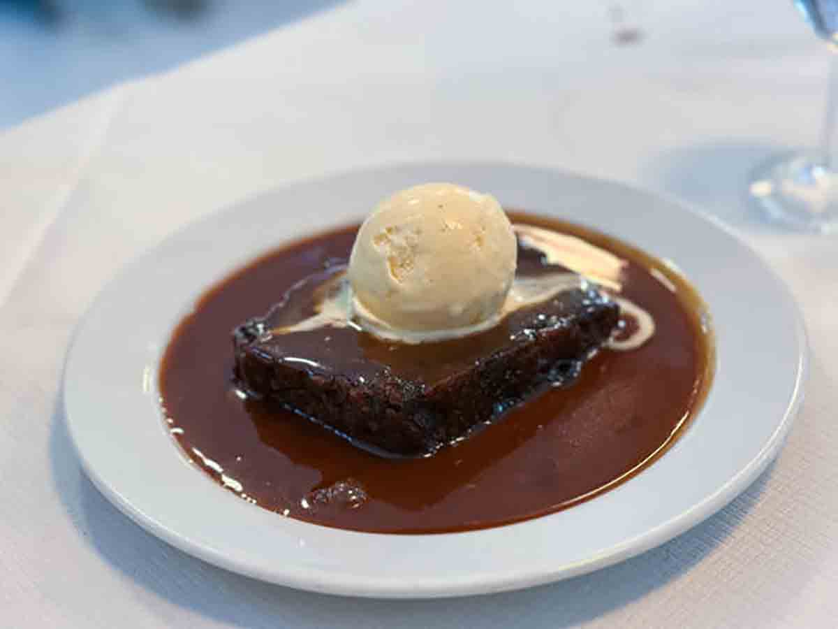 Plate Of Sticky Toffee Pudding In A Bowl