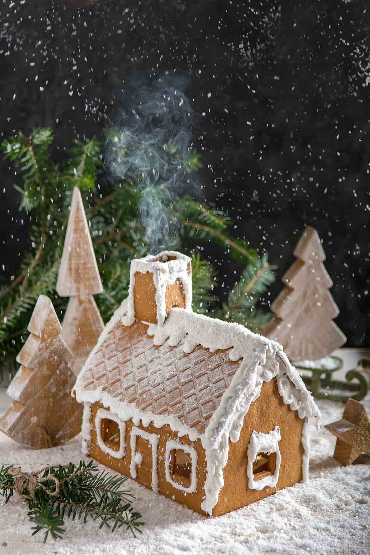 Edible House With Icing Sugar Snow Falling On Top