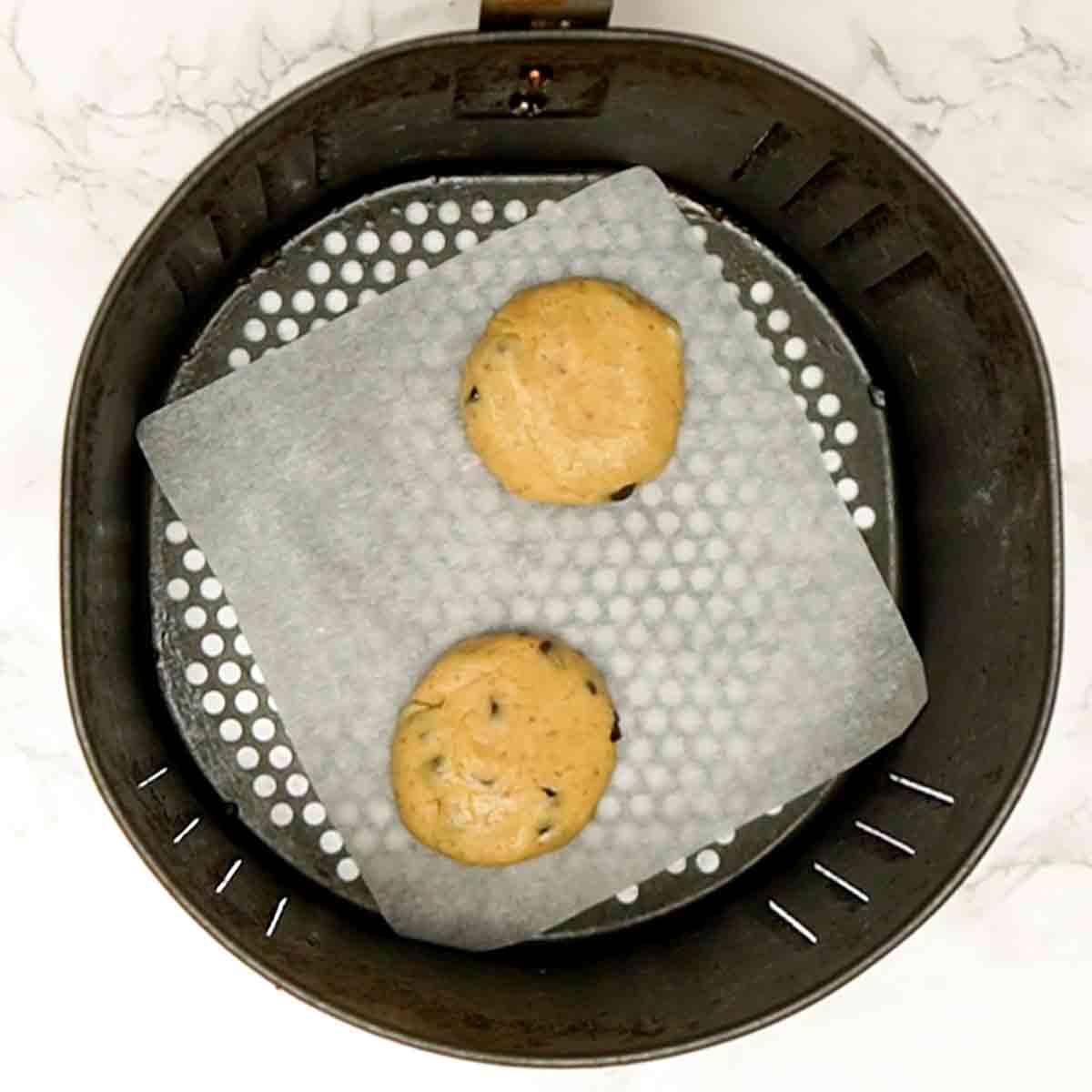 Two Balls Of Eggless Cookie Dough In Air Fryer