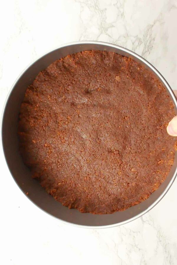 Cheesecake Base Flattened Into Tin