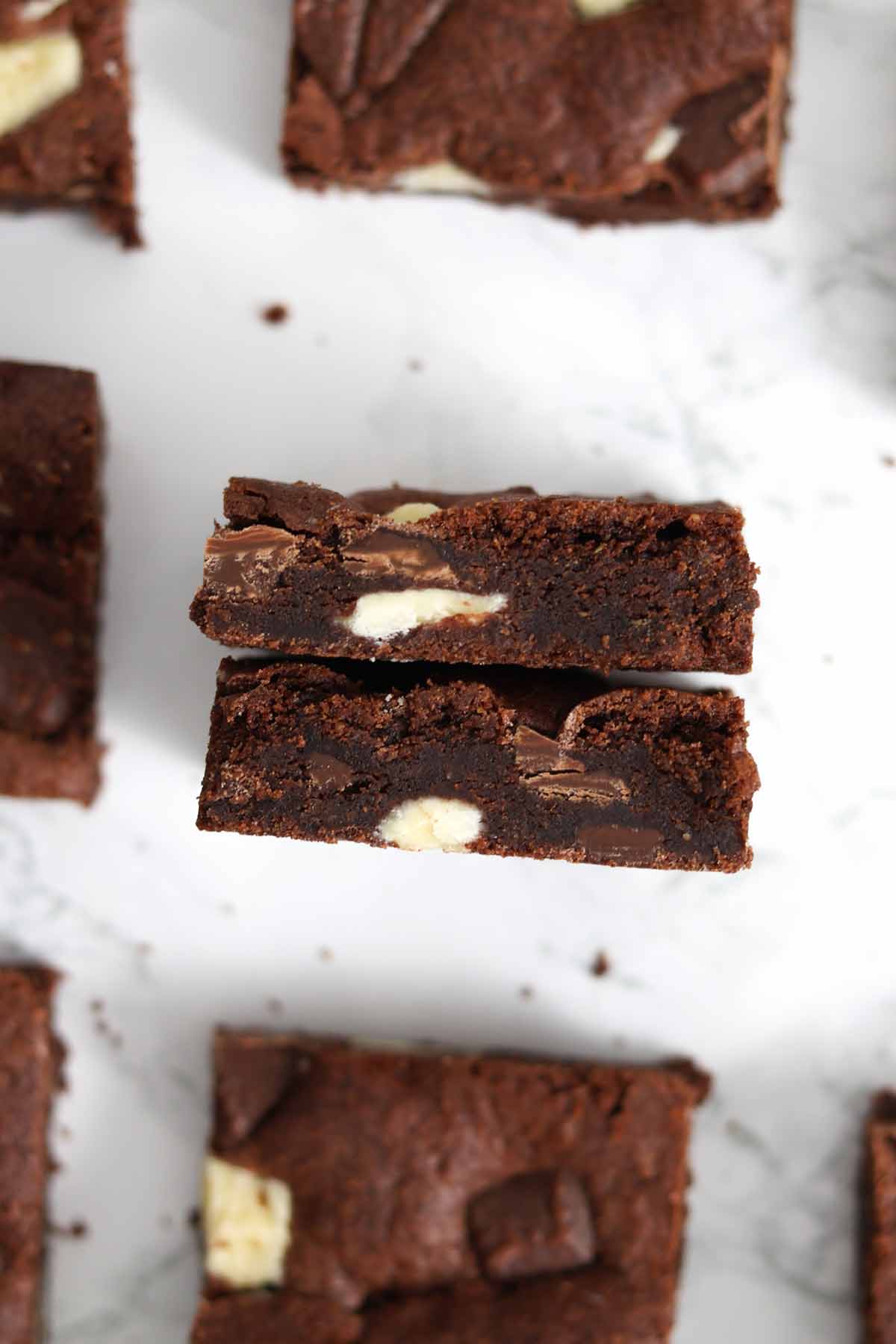 Overhead Image Of Two Vegan Triple Chocolate Cookie Bars Facing Upwards